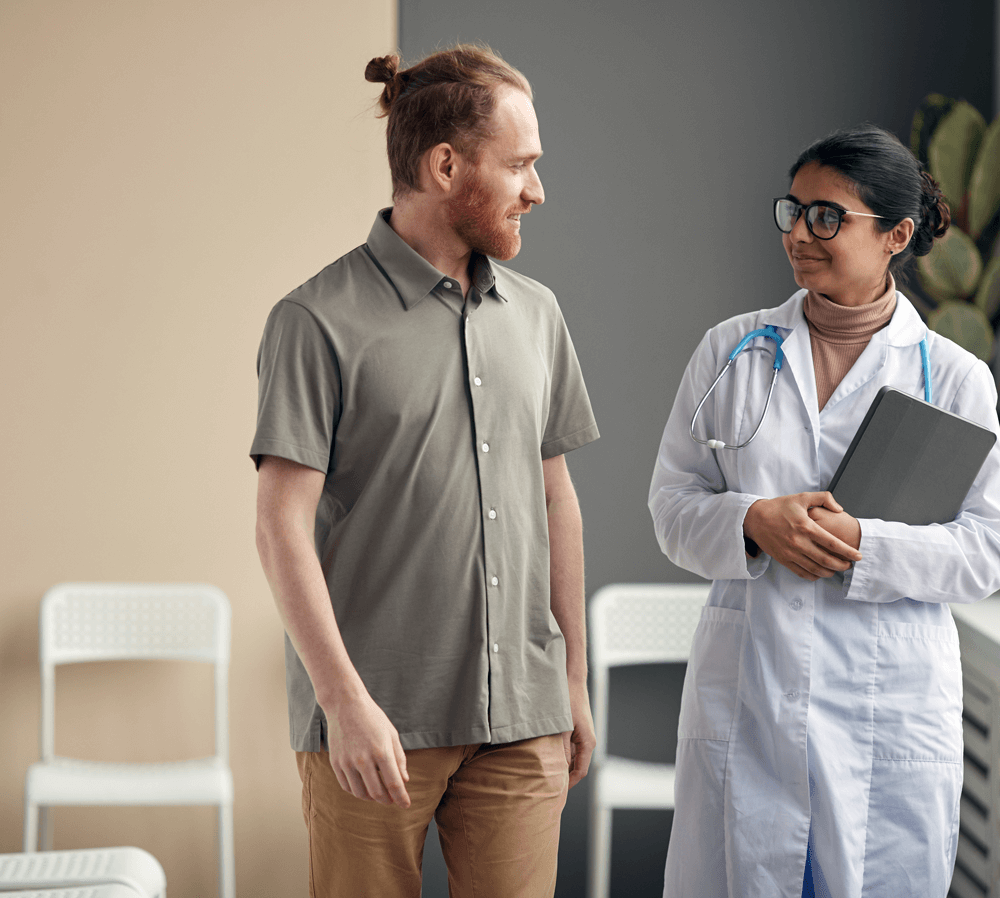 a physician and patient talking