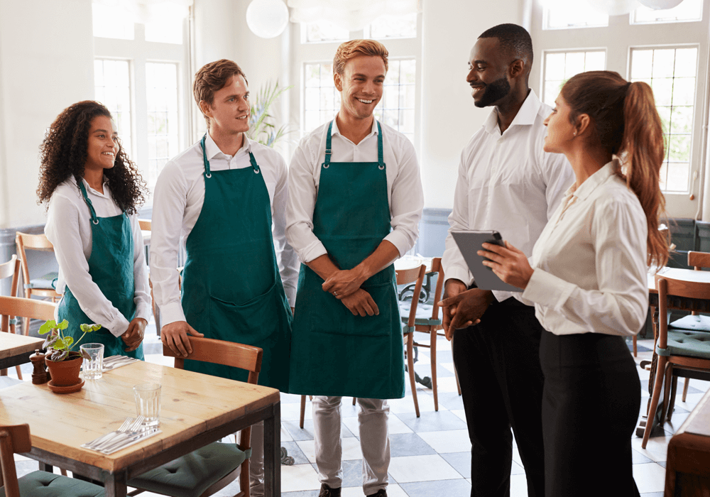 a restaurant staff talking about restaurant reputation management services